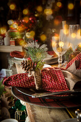 Fototapeta na wymiar .Christmas table set with bokeh lights. Selective Focus