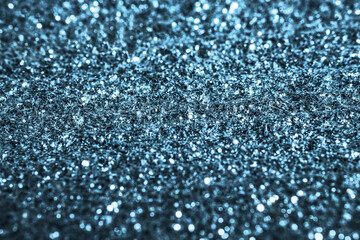 Blue  glitter texture  sparkling shiny  paper background for Christmas holiday wallpaper decoration, greeting and wedding invitation card design element, Xmas abstract background with copy space