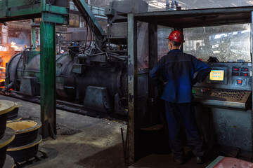 Fototapeta na wymiar Iron pipe centrifugal pipe casting machine at the foundry