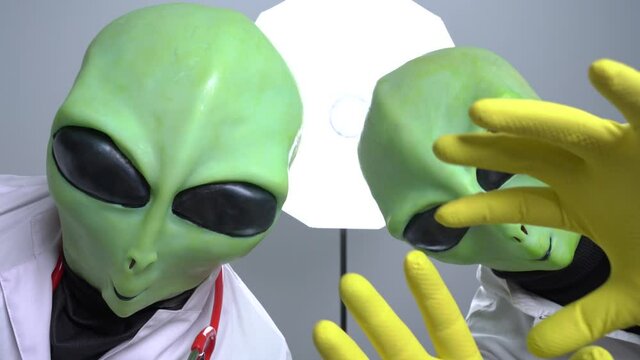 Aliens robbed someone to conduct experiments on them, torture and implant microchip. Humanoids turn their heads, talk and scare. View through eyes of victim.