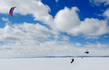 Snowkiter and aerial manouver on Lake Simcoe Ontario