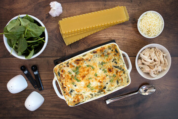 Chicken Spinach Lasagna on a Wooden Background