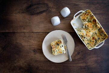 Chicken Spinach Lasagna on a Wooden Background