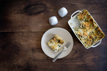 Chicken Spinach Lasagna on a Wooden Background