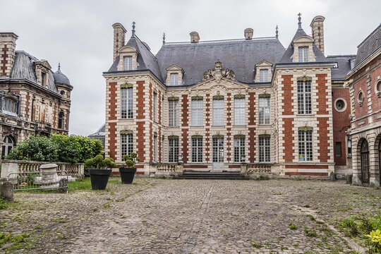 Beautiful architecture of ancient French buildings: Brick and stone building known today as Hotel de Berny built during the years 1633 and 1634. Amiens. Somme department, Picardie, France. 