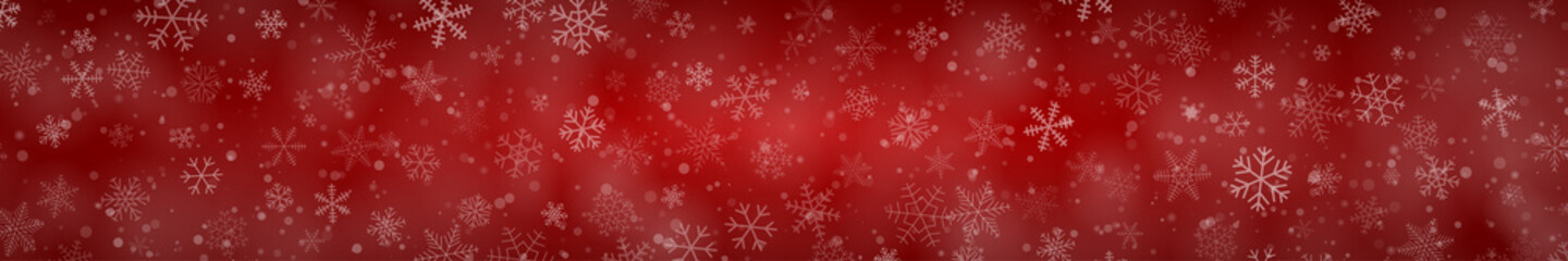 Christmas banner of snowflakes of different shapes, sizes and transparency on red background
