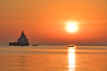 Obraz premium Lighthouse at Sunrise
