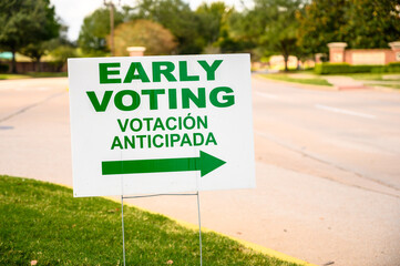 A sign directs residents to an early voting polling location for the 2020 Presidential election.