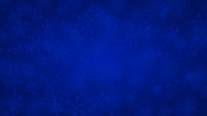 Christmas background of snowflakes of different shapes, sizes and transparency in blue colors