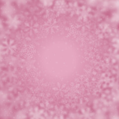 Christmas background of snowflakes of different shape, blur and transparency, arranged in a circle, on pink background