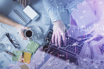 Double exposure of man and woman working together and forex graph hologram drawing. Financial analysis concept. Computer background. Top View.