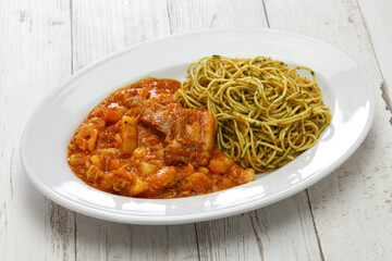 carapulcra con sopa seca, peruvian dried potato stew with basil pasta