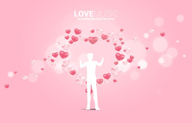 Vector silhouette of conductor standing with piano key with heart balloon flying . Concept background for love song and concert theme.