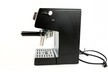 Black and silver espresso machine with cord coiled behind it side view with steaming wand to the...