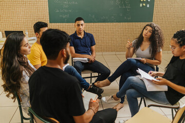 Latin students in the classroom. students doing group study