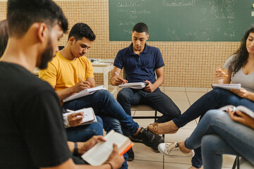 Latin students in the classroom. students doing group study.