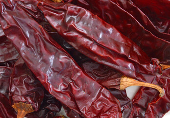 dried guajillo chili against on background.