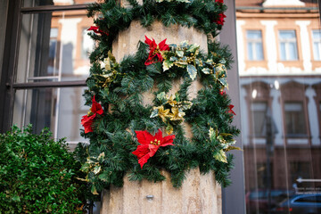 Fototapeta na wymiar City street outdoor decorated Christmas branch