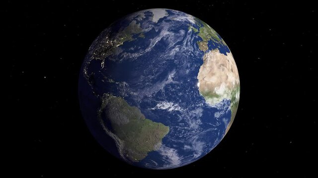 Earth turning from Europe to north America while sun is rising and lights are turing off and stars are in the backround spinning beautifully.