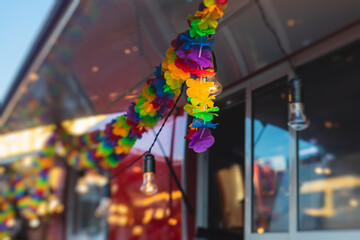 Girl ordering street food in colourful food truck van on food festival, summer sunny day