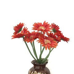 red gerber flowers in vase