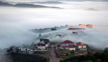 Fototapeta premium Small town in the clouds