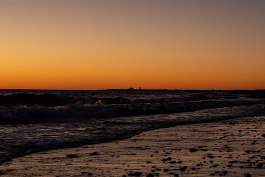 Waves Break At Sunset On Herring Cove Beach In Provincetown, MA