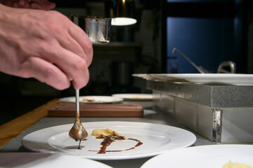 High cuisine resstaurant's kitchen elaborating food