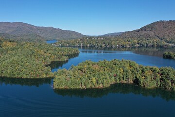 Fototapeta na wymiar Aerial view of Lake Santeetlah, North Carolina and surrounding national forests in autumn color.