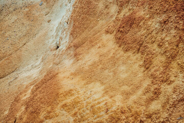 Nature background of cracked dry lands. Natural texture of soil with cracks. Broken clay surface of barren dryland wasteland close-up. Full frame to terrain with arid climate. Lifeless desert on earth
