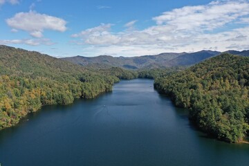 Aerial view of Lake Santeetlah, North Carolina and surrounding national forests in autumn color.