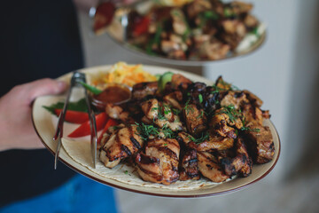 Variety assortment of traditional main course meat barbecue grill dishes of Caucasian cuisine, with shashlik on skewer, Lyulya kebab, kebab, Azerbaijani cuisine