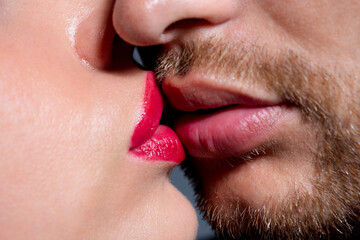 Kiss . Sexy couple In Love. Intimate relations. Close-up mouths kissing. Passion and sensual touch. Romantic man with woman lips kisses. Lovely people dating. Valentine Day. Cropped macro beauty face.