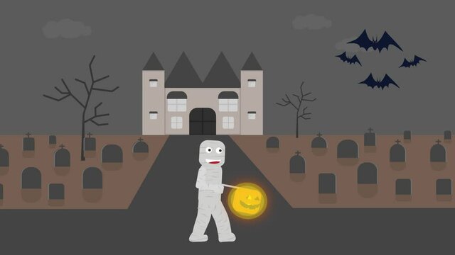 Little boy wears mummy costume in the graveyard