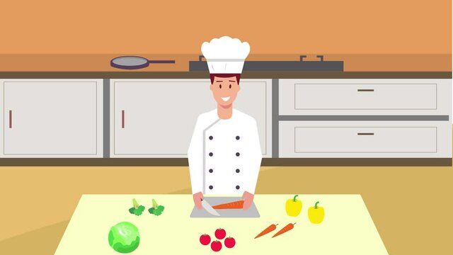 Male chef cutting vegetables in the kitchen