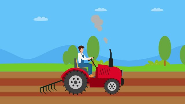 Male farmer plowing the farmland with a tractor