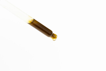 Close up of the tip of a hemp oil dropper