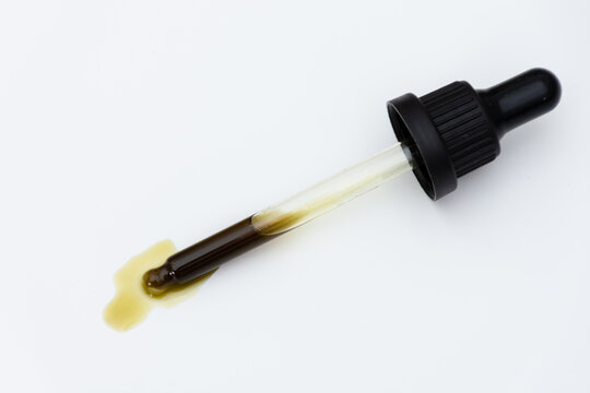 Close up of a hemp oil dropper