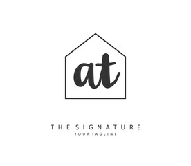 A T AT Initial letter handwriting and signature logo. A concept handwriting initial logo with template element.