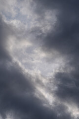 thick black clouds cover up the sky on an overcast day