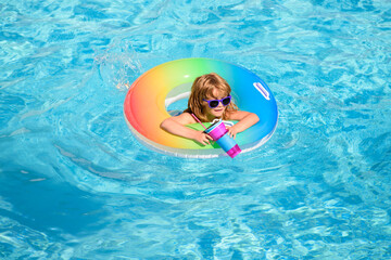 Summer vacation fun. Cute child boy kid in swimming pool.
