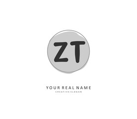 Z T ZT Initial letter handwriting and signature logo. A concept handwriting initial logo with template element.