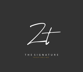 Z T ZT Initial letter handwriting and signature logo. A concept handwriting initial logo with template element.