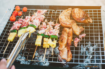 Close up delicious grilled meat, steak, barbecue on the charcoal grill.