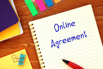 Financial concept meaning Online Agreement with sign on the piece of paper.