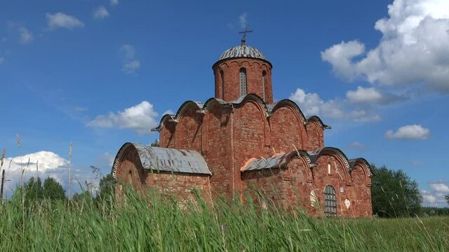 The old Church of the Transfiguration on Kovalev close-up on a Sunny June day. The Surrounding area of Veliky Novgorod, Russia  