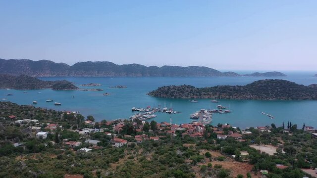 Kekova,  Sunken city, Wreck city ( Dolichiste )  Bay marina and Ucagiz fishing village. Aerial view Drone shooting 4K. Antalya &ndash; TURKEY 