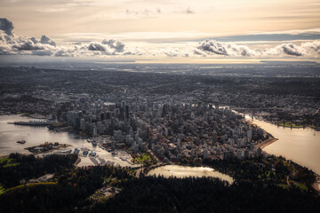Downtown Vancouver, British Columbia, Canada. Aerial View of the Modern Urban City, Stanley Park, Harbour and Port. Viewed from Airplane Above during a sunny morning. Artistic Render