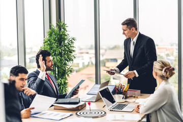 Group of professional business meeting and discussing strategy with new startup project.Creative business people planning and brainstorm with laptop computer in modern office.Teamwork concept