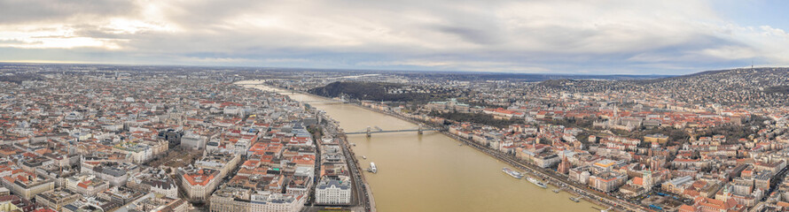 Obraz premium Aerial panoramic drone shot of Budapest by Danube river in winter morning
